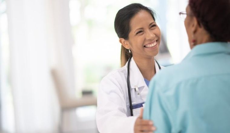 A doctor consulting with a patient