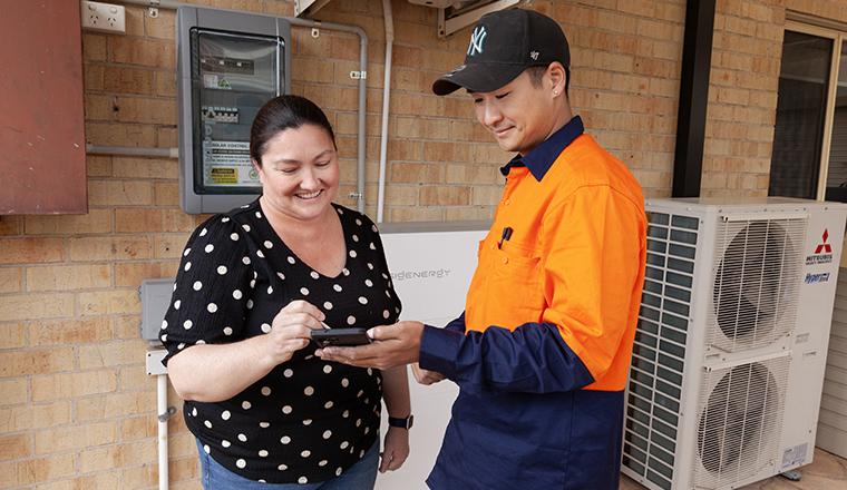 Woman signing up household battery