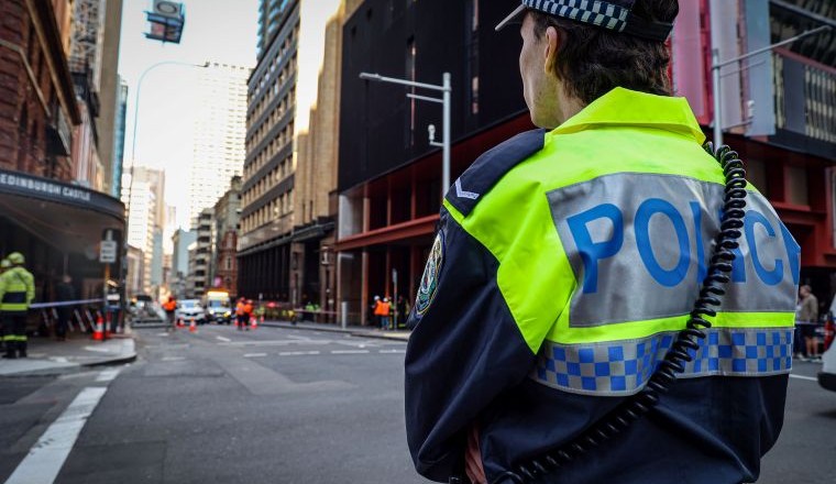 A police officer wearing high-visibility uniform