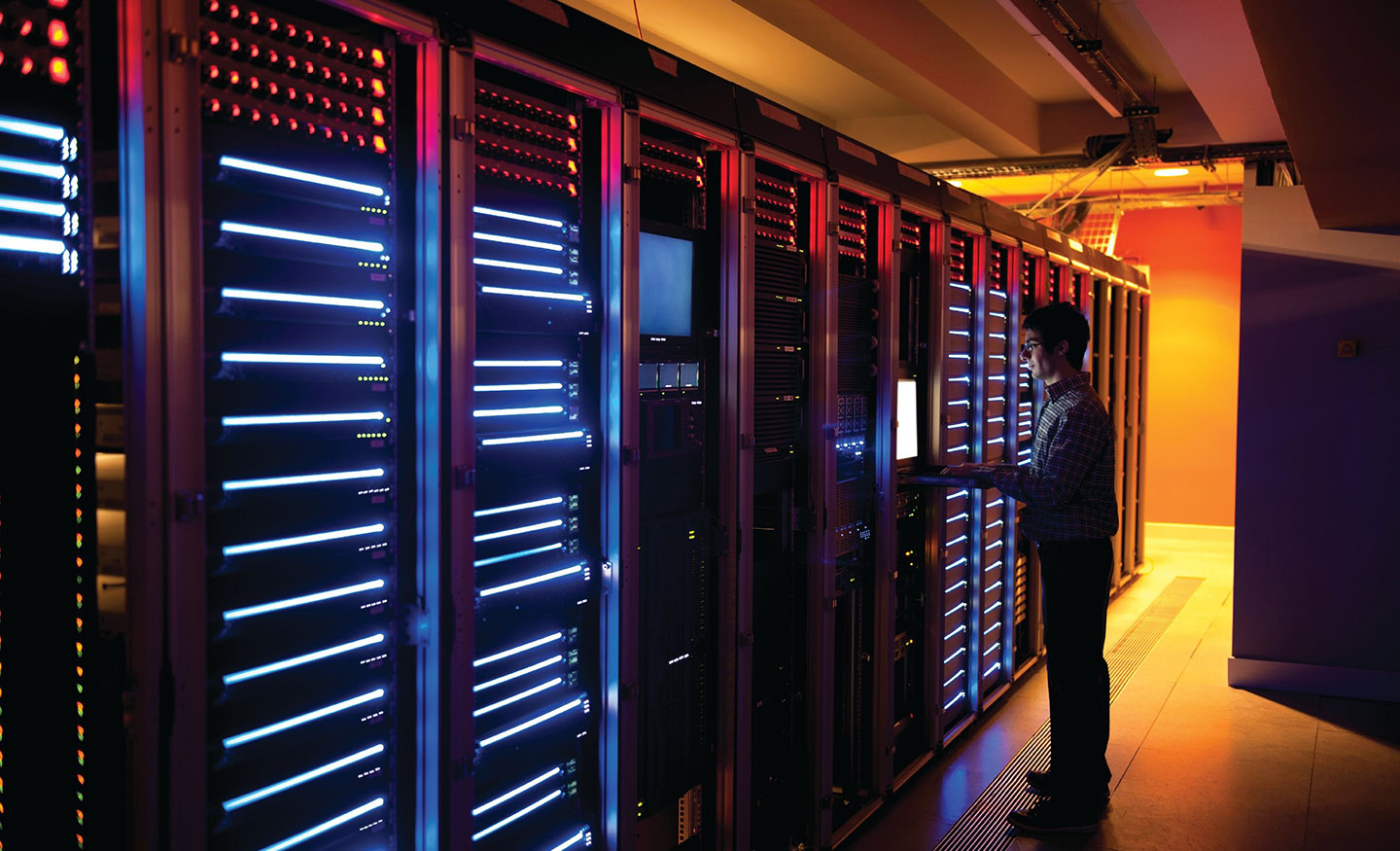 Person checks something in a data centre