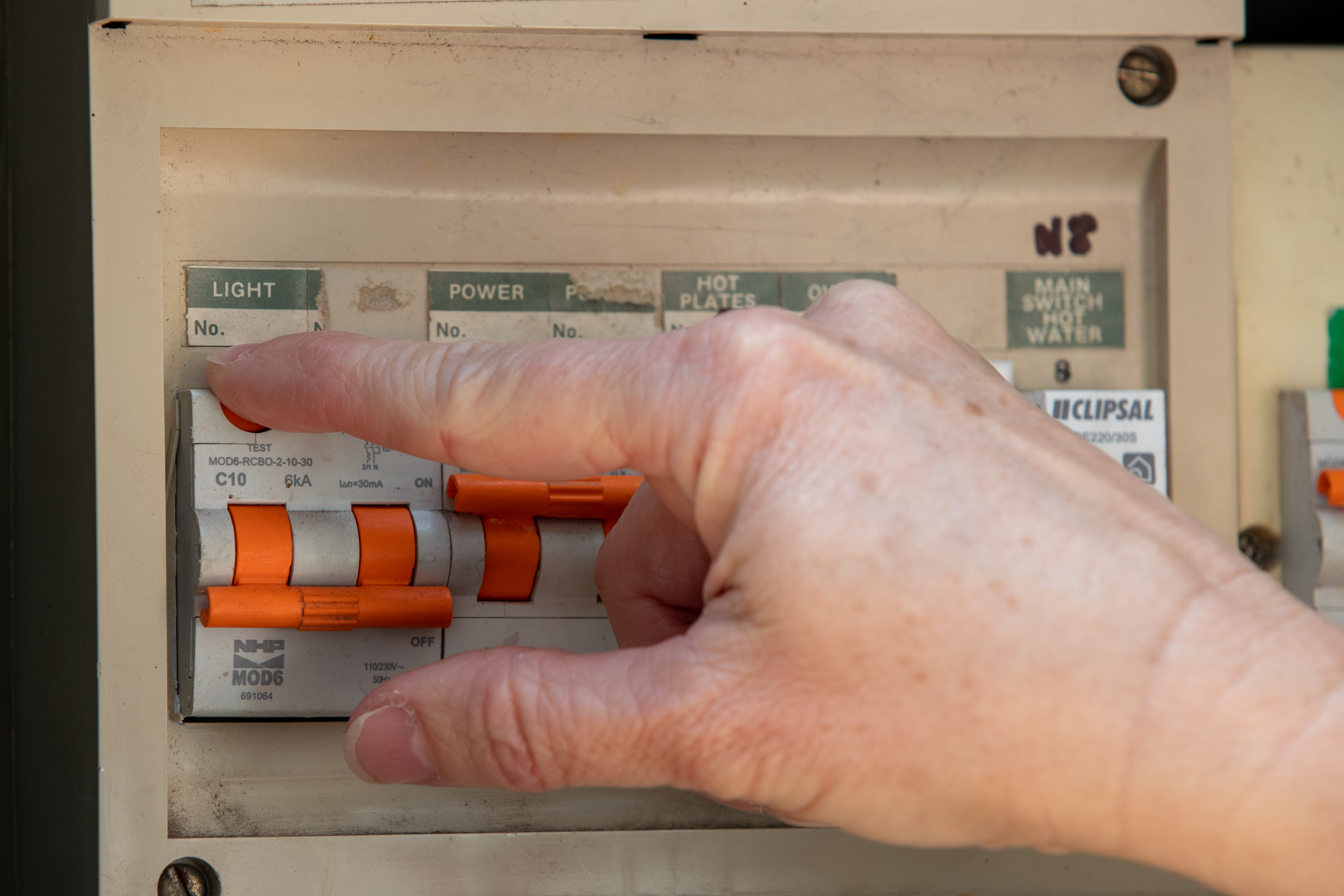 The test button on an electrical switchboard