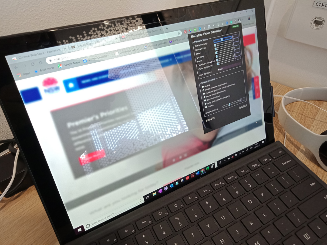 Laptop-demonstrating-the-NoCoffee-Vision-Simulator-app-simulating-blurred-or-low-vision