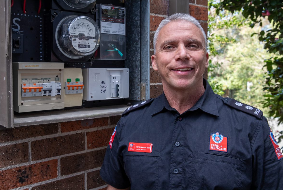 firefighter at circuit board