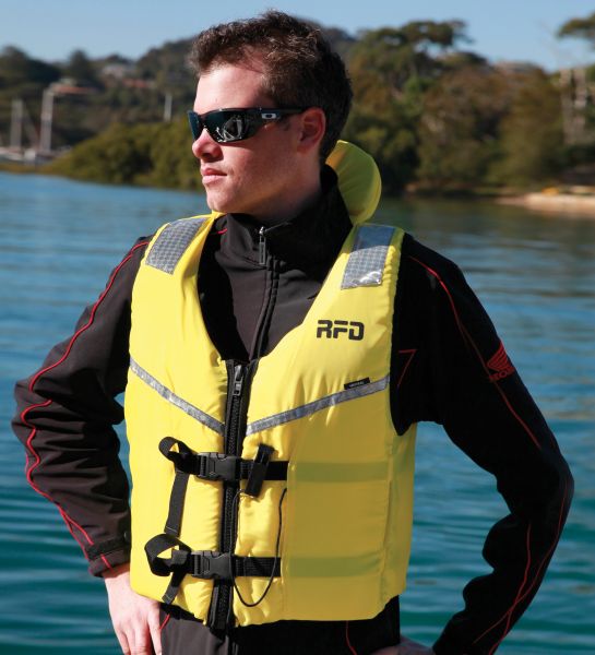 Adult wearing level 100 above non-inflatable lifejacket