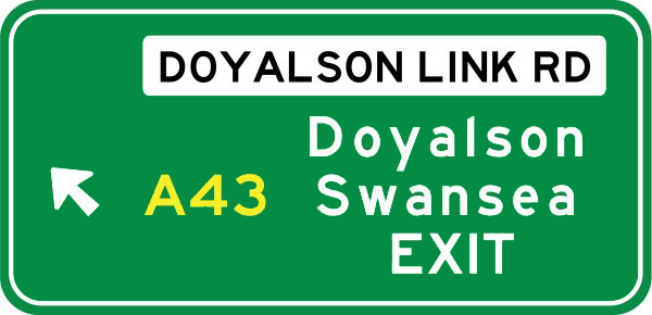 Road sign indicating motorway exit to a named road