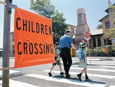 Children's crossing designated by orange flags