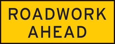 Roadwork underway ahead. Slow down and proceed with caution
