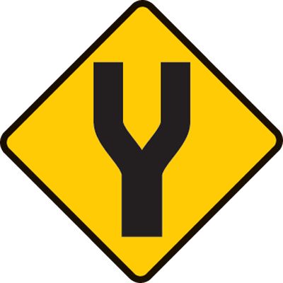 Road ahead becomes a divided road. Ensure you stay left