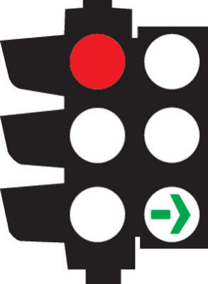 Traffic light showing a red light and a green right arrow
