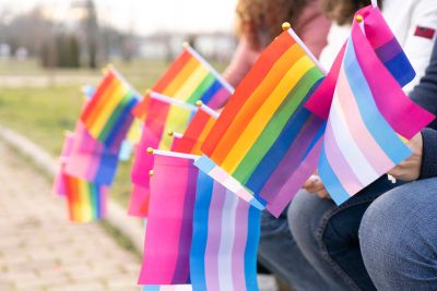 Rainbow flags held by a group of people