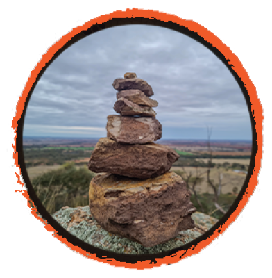 Symbolically stacked rocks in an outback setting