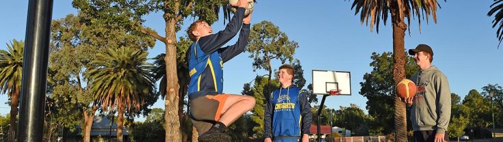 Boys using the Narrandera Park basketball court