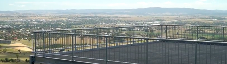 Boardwalk at top of Mount Panorama with view over Bathurst