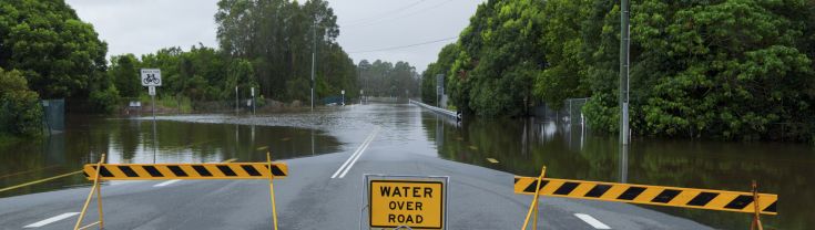 Grants flooded road and signs