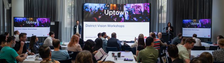 Crowd of people at Uptown Vision Workshop