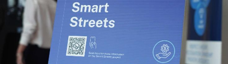 Sign that says "Smart Western Sydney Showcase: Smart Streets".