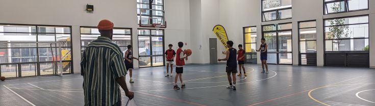 young people playing basketball at Arncliffe Youth Centre