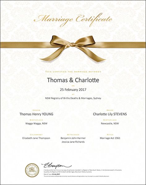 Gold bow commemorative marriage certificate.