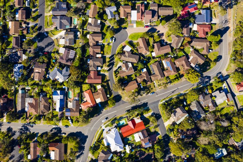 Aerial photo of roof tops of houses in Sydney suburb