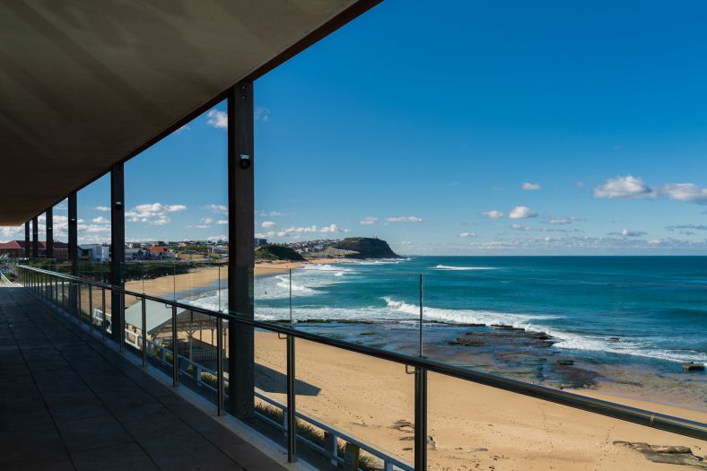 Deck overlooking the beach at Merewether Surfhouse