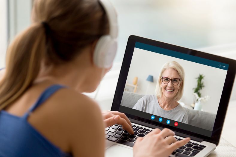 girl on a video call with an older grandmotherly woman