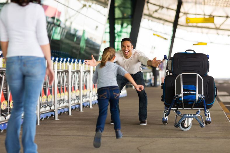 Family greeting at airport