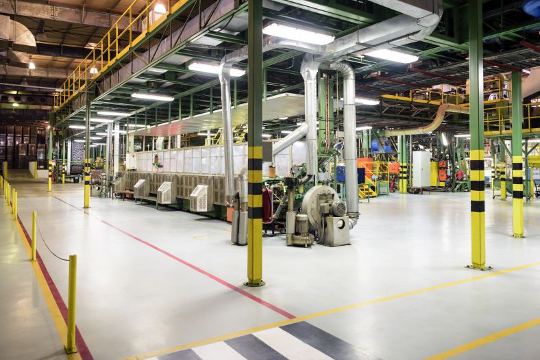 Worker's walkway inside aluminium processing plant.