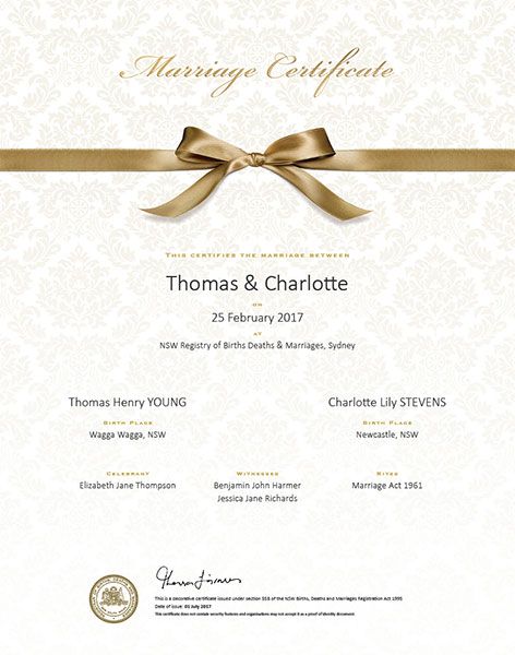 Gold bow commemorative marriage certificate.