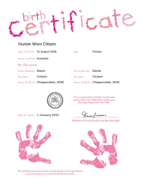 A commemorative birth certificate featuring pink handprints 