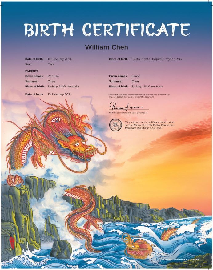 An commemorative birth certificate with a colourful illustration of a Dragon over sea cliffs, representing the Year of the Dragon