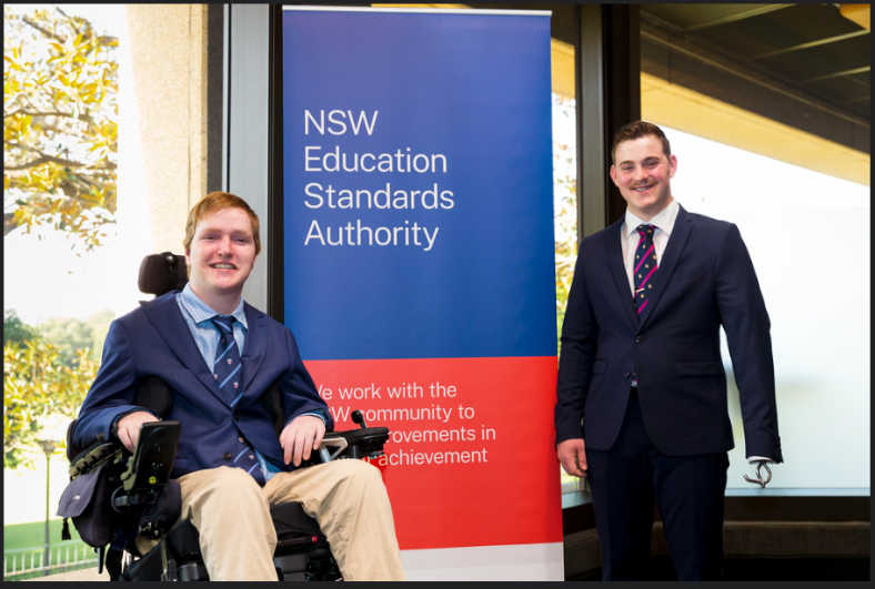 A photograph of two of the three 2022 Brother John Taylor Prize recipients, Harrison Crisp and Michael Ryan