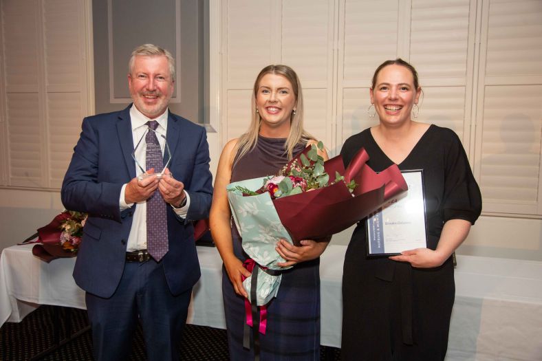 Brooke Delaney receives WNSWLHD's Nurse of the Year award from senior leaders