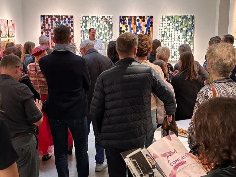 People at an art gallery opening