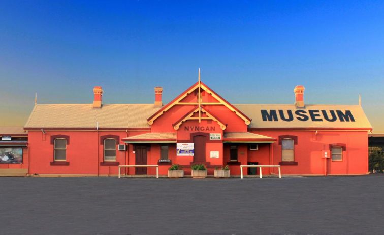 red building that is the visitor information centre at Nyngan