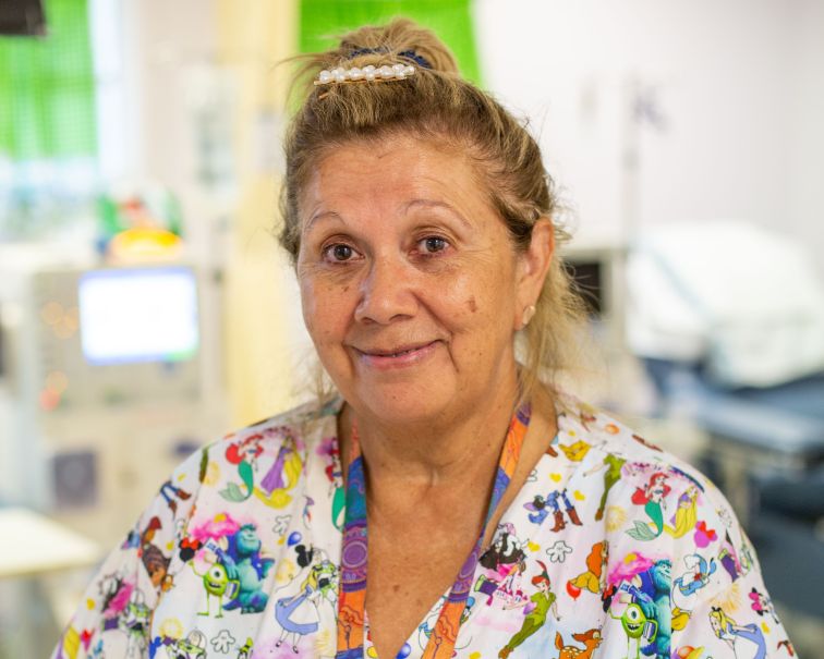 female nurse at Brewarrina health service wearing colourful scrubs