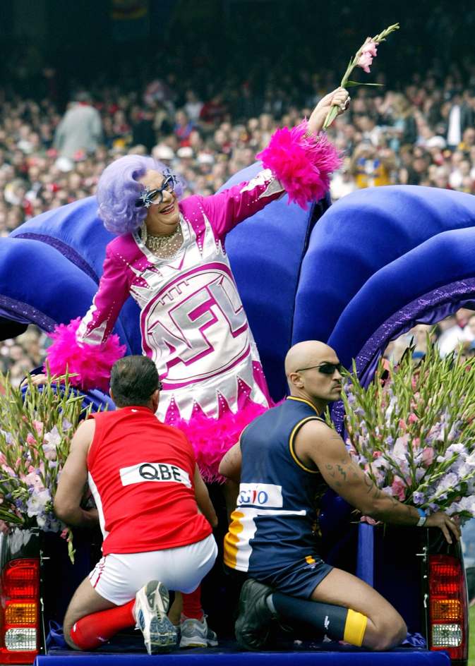 Dame Edna Everage entertains the crowd during the pre-match entertainment at the 2005 AFL Grand Final.
