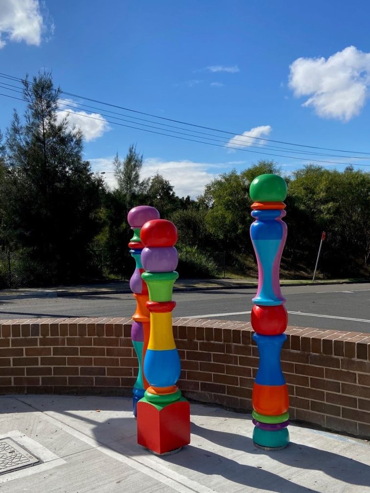 colourful sculptures on a street corner