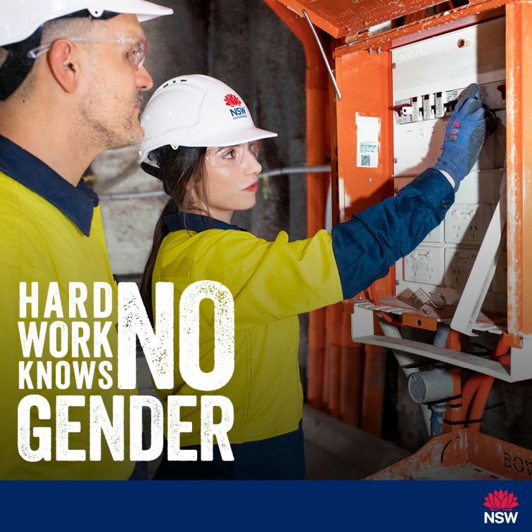 Social media tile for the Women in Construction Gender Diversity Awareness Campaign. The images depicts a man and a woman working on a construction site. The woman is working in an electric box while the man supervises.  The slogan Hard Work Knows No Gender is written in white and is located on the left above the blue footer. The footer includes the NSW Government waratah logo justified to the right at the bottom. The tile is 1080x1080 pixels in size.