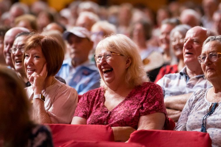 seniors laughing in audience