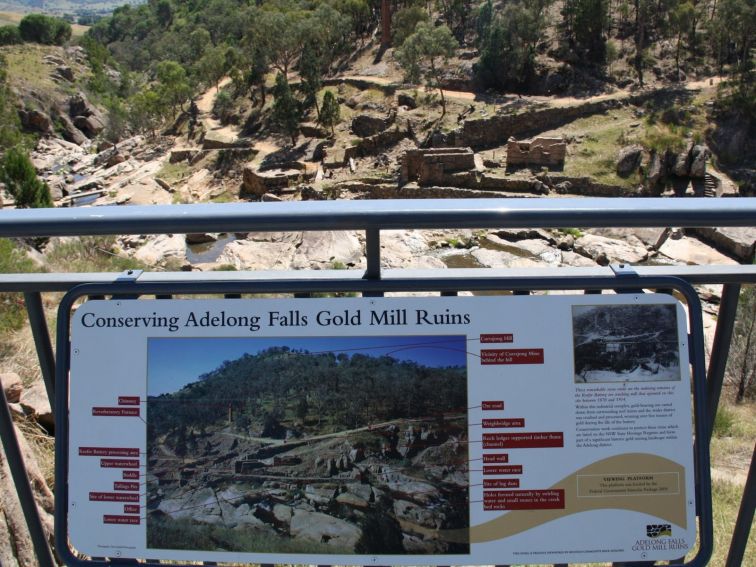 One of the interpretive signs throughout the Adelong Falls Gold Mill Ruins