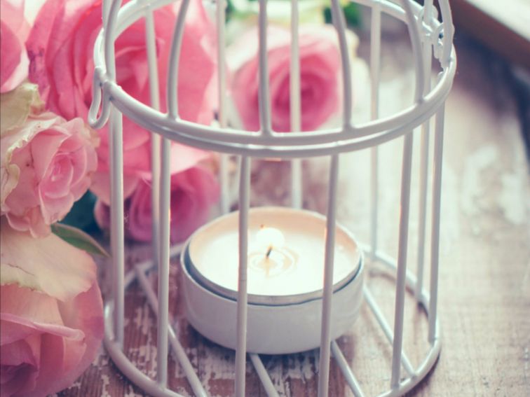Candle in cage