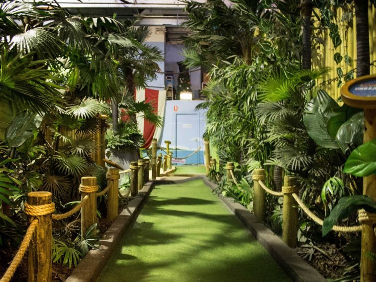 Jungle themed hole at mini golf