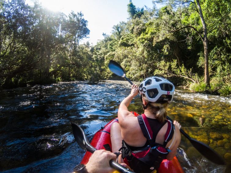 Barrington River adventure woman paddling