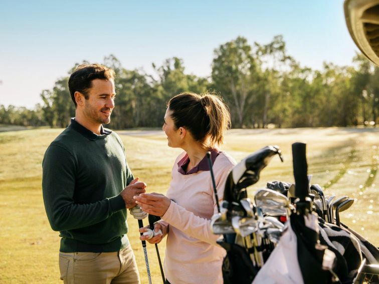 Couple enjoying a day of golfing at Yarrawonga Mulwala Golf Club Resort