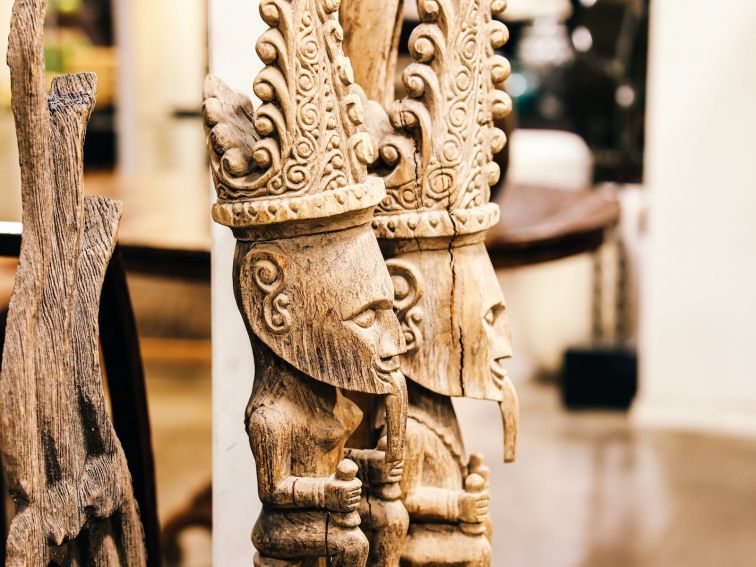 Intricately hand carved house posts from East Timor