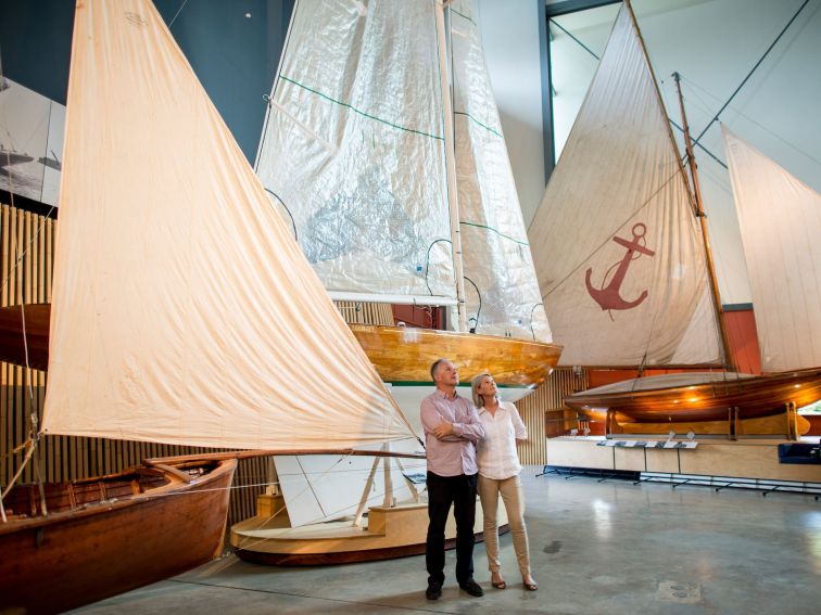 Historical wooden boats in the Heritage Gallery at the Australian National Maritime Museum