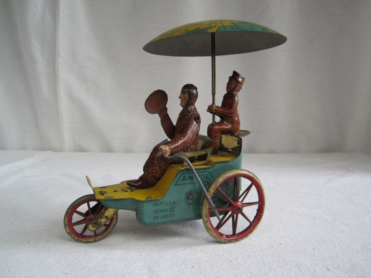 Clockwork tinplate three wheeled toy car. Made in Germany about 1910