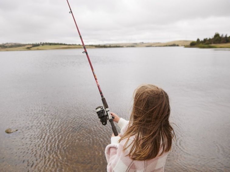 Young girl fishing at Pejar Dam
