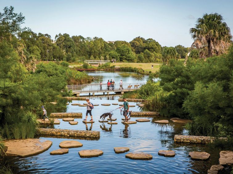 Family enjoying the picturesque wetlands located in the award-winning Sydney Park, St Peters
