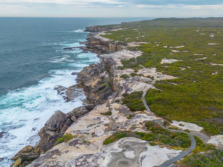 Aerial photo of the walking track from Cape Solander leading south to Cape Baily with coastal